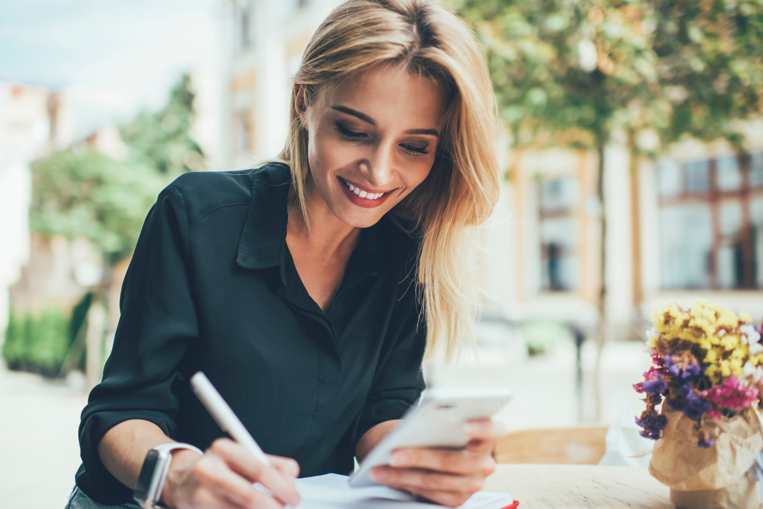 woman writing social media content