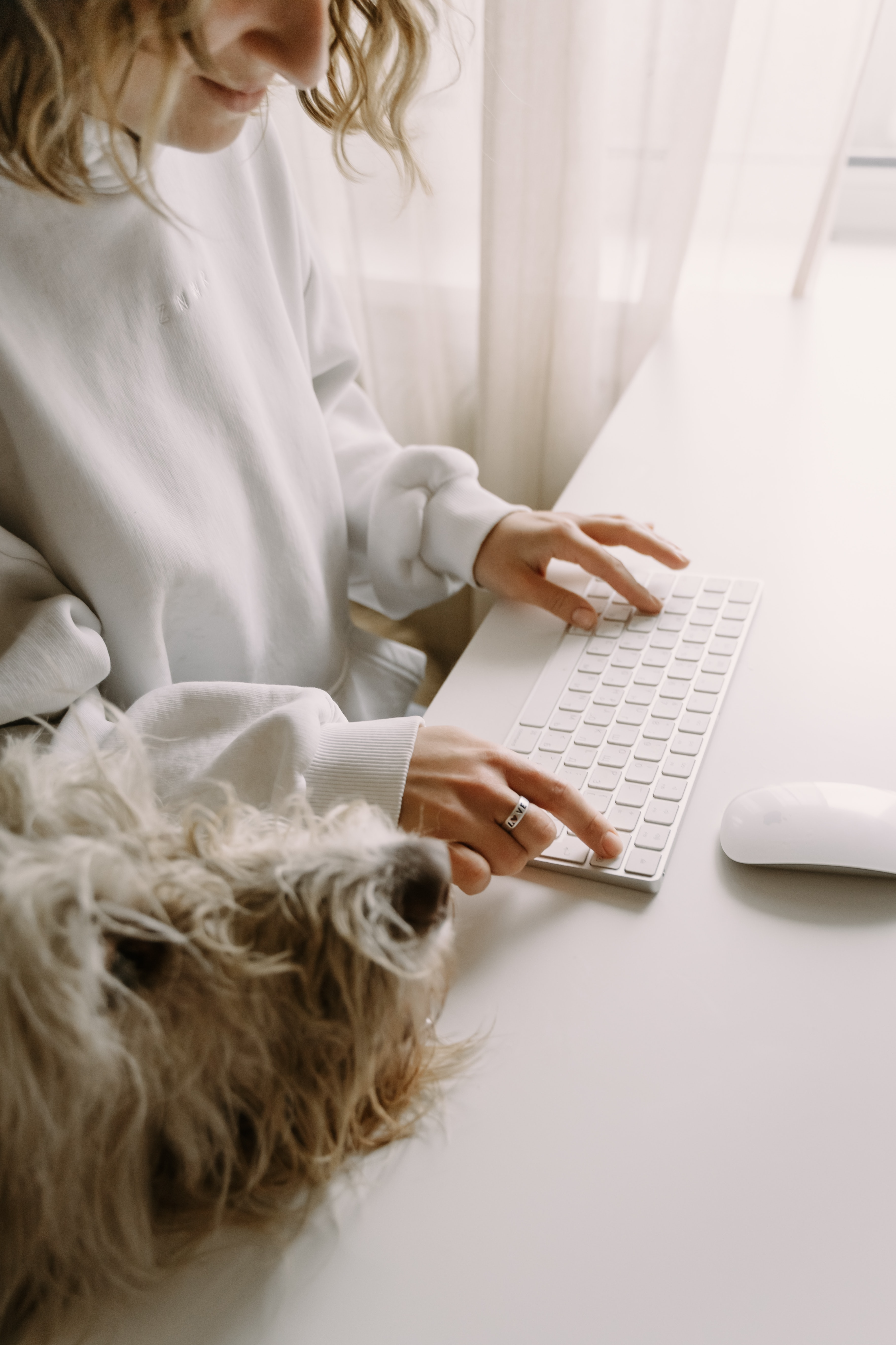 Woman tracking social media metrics on computer