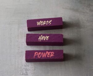 three blocks that say "Words Have Power"